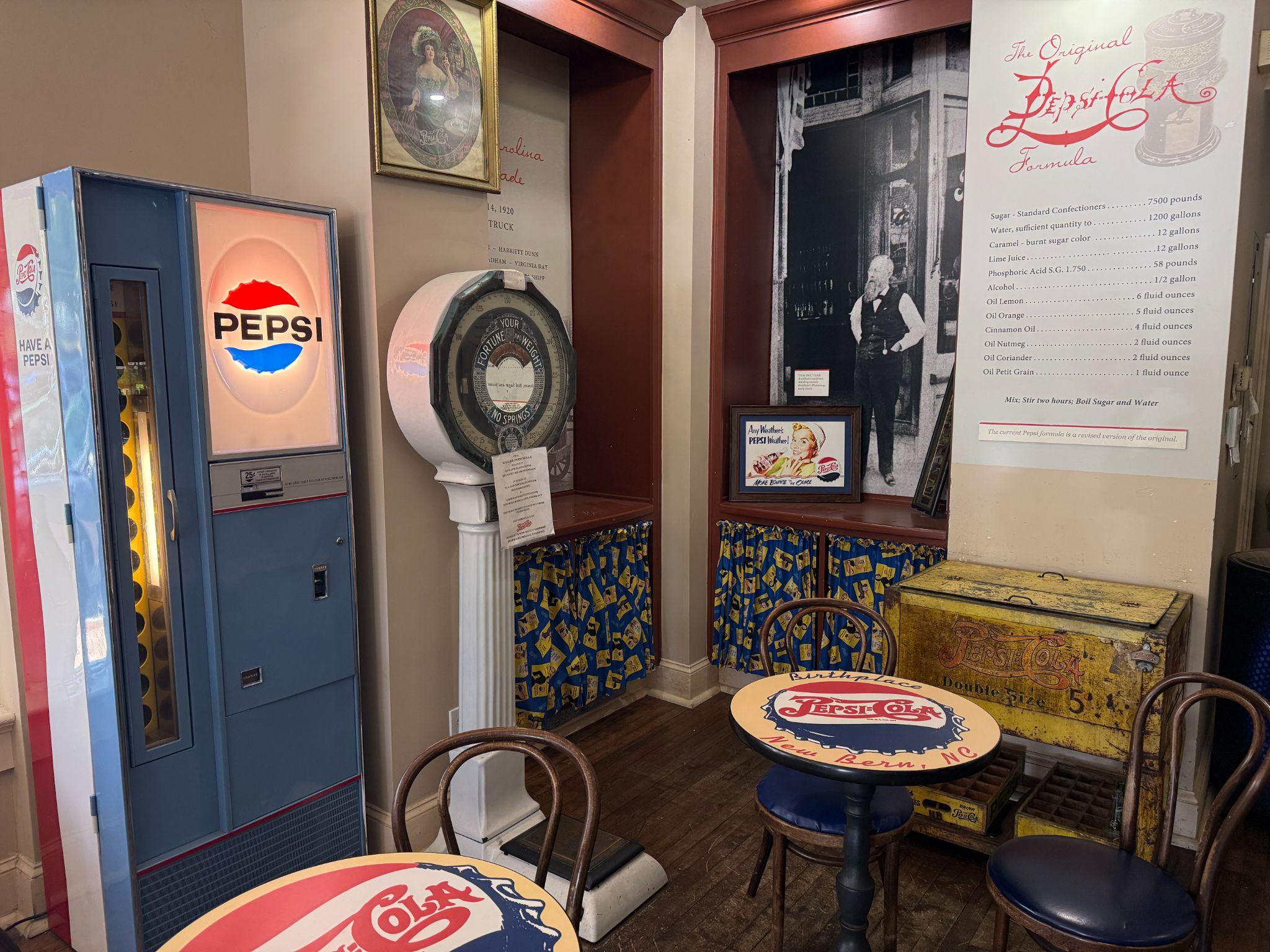 Vintage Pepsi memorabilia inside the Birthplace of Pepsi-Cola store in downtown New Bern, including an old Pepsi machine and the original formula